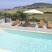 Casa Vacanze Lubagnu Vacanze , Lubagnu Vacanze-appartamento B, alloggi privati a Sardegna Castelsardo, Italia - piscina vista